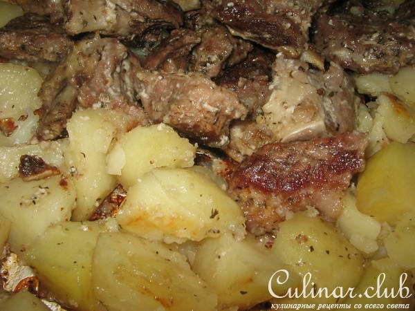 Маринованные рёбрышки запеченные с картошкой.